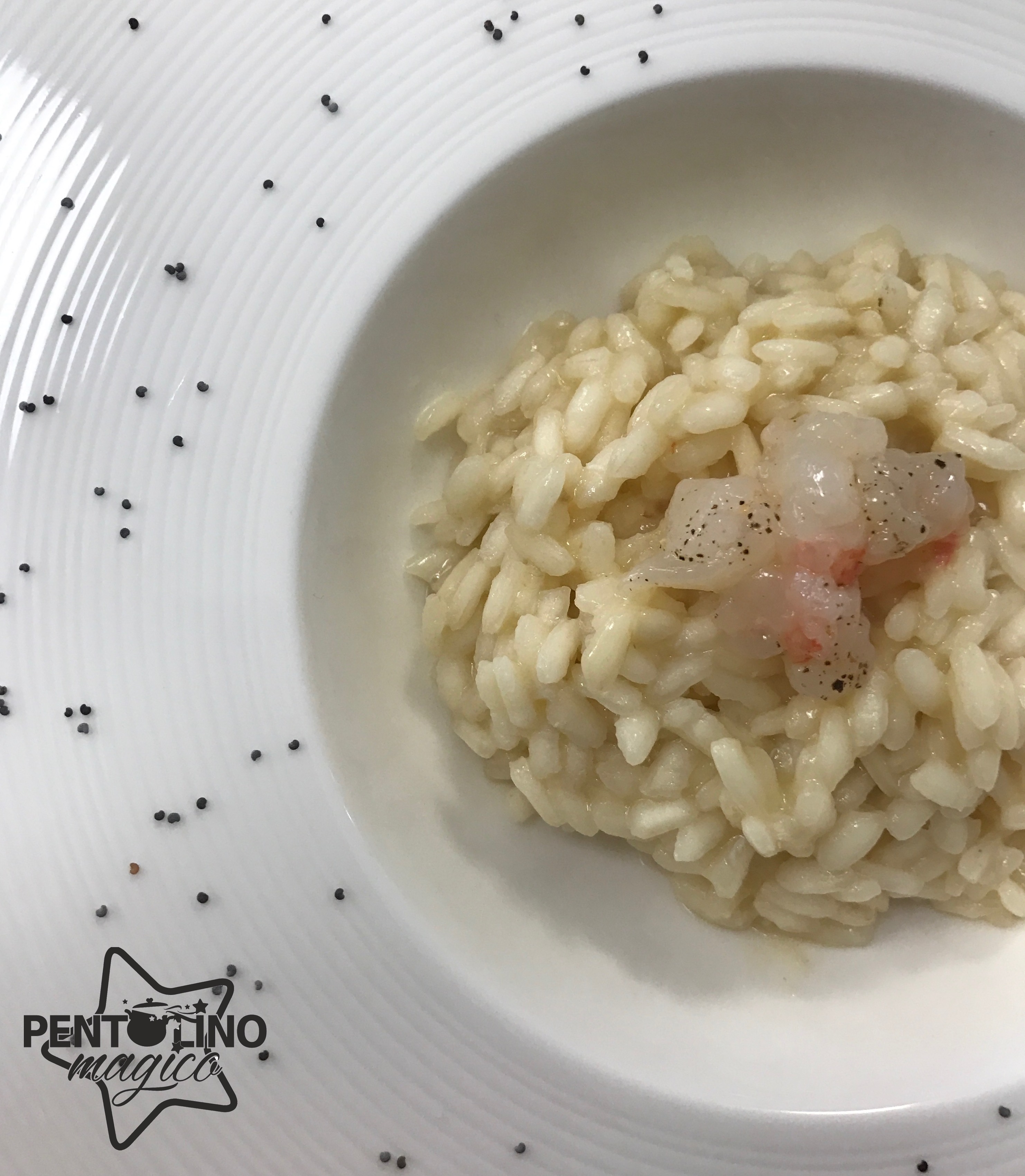 Risotto scampi cotti e crudi